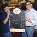 Pippa and Roger hold up the results list, A Welly Boot of Beer at the Swan Inn, Brome, Suffolk - 15th June 1996