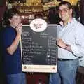 Pippa and Roger hold up the results list, A Welly Boot of Beer at the Swan Inn, Brome, Suffolk - 15th June 1996