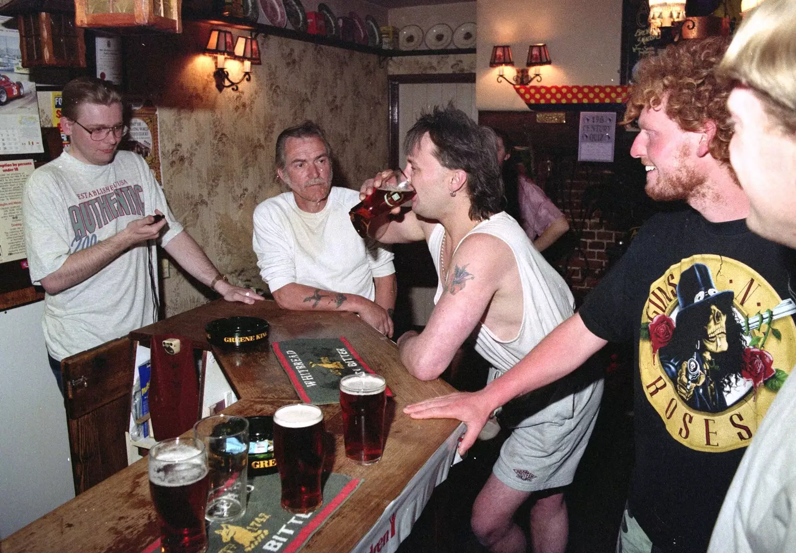 Jimmy starts the boot, as Ian starts the stopwatch, from A Welly Boot of Beer at the Swan Inn, Brome, Suffolk - 15th June 1996