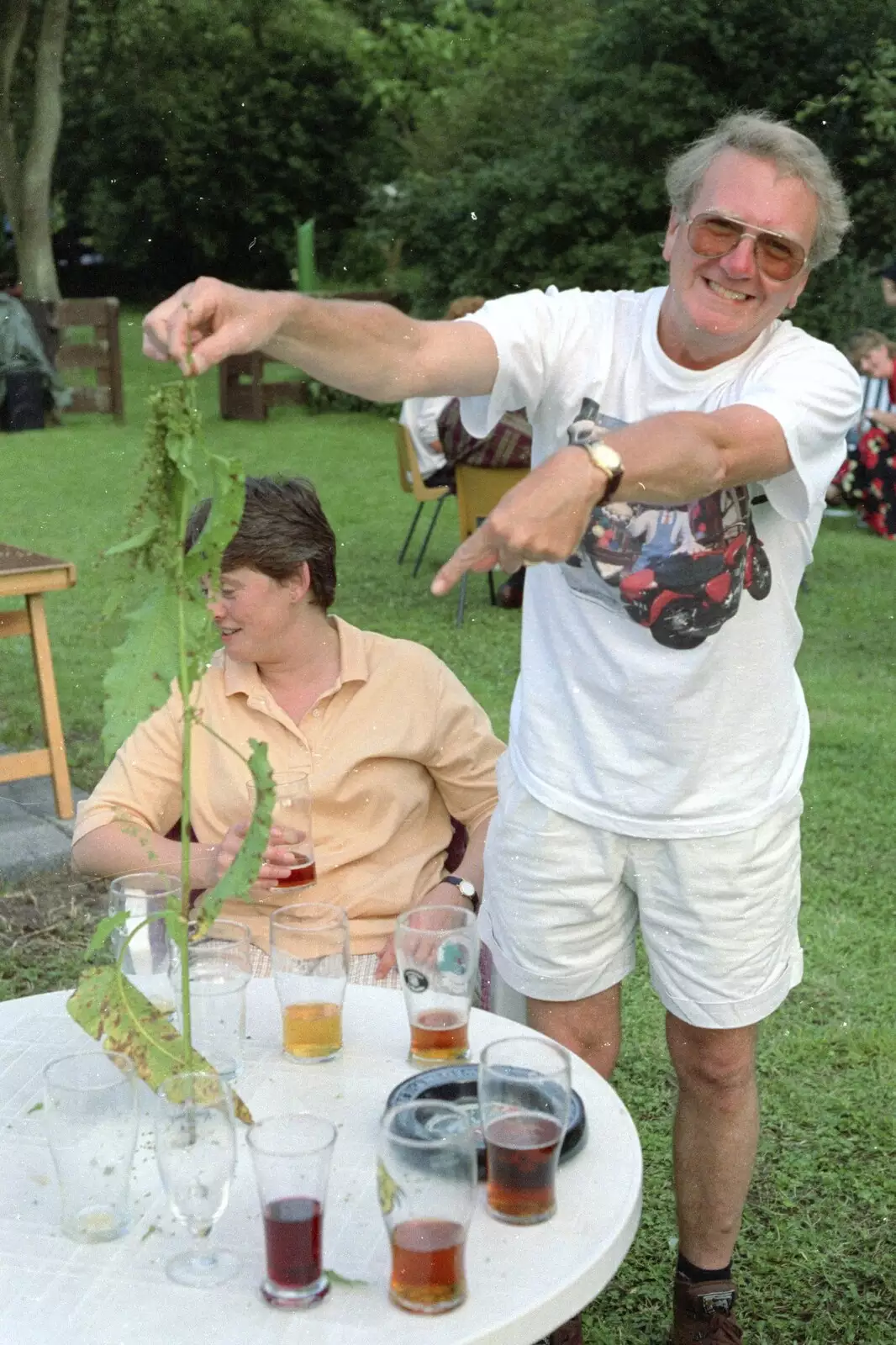 John Willy's dug a weed up from the garden, from DH's Barbeque at The Swan Inn, Brome, Suffolk - July 14th 1996