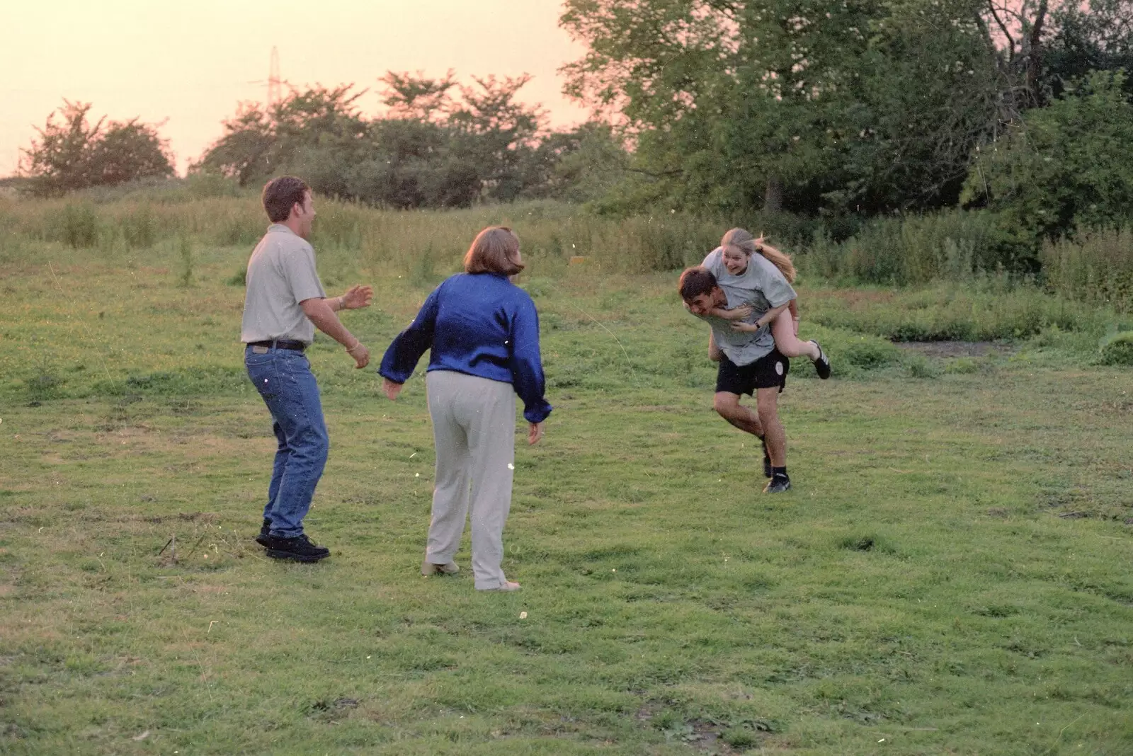 Shane gives Lorraine a piggy-back, from DH's Barbeque at The Swan Inn, Brome, Suffolk - July 14th 1996