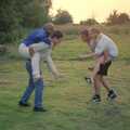 DH's Barbeque at The Swan Inn, Brome, Suffolk - July 14th 1996, There's some piggy-back action in the garden