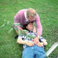 Apple gets thrashed with a tree branch, DH's Barbeque at The Swan Inn, Brome, Suffolk - July 14th 1996