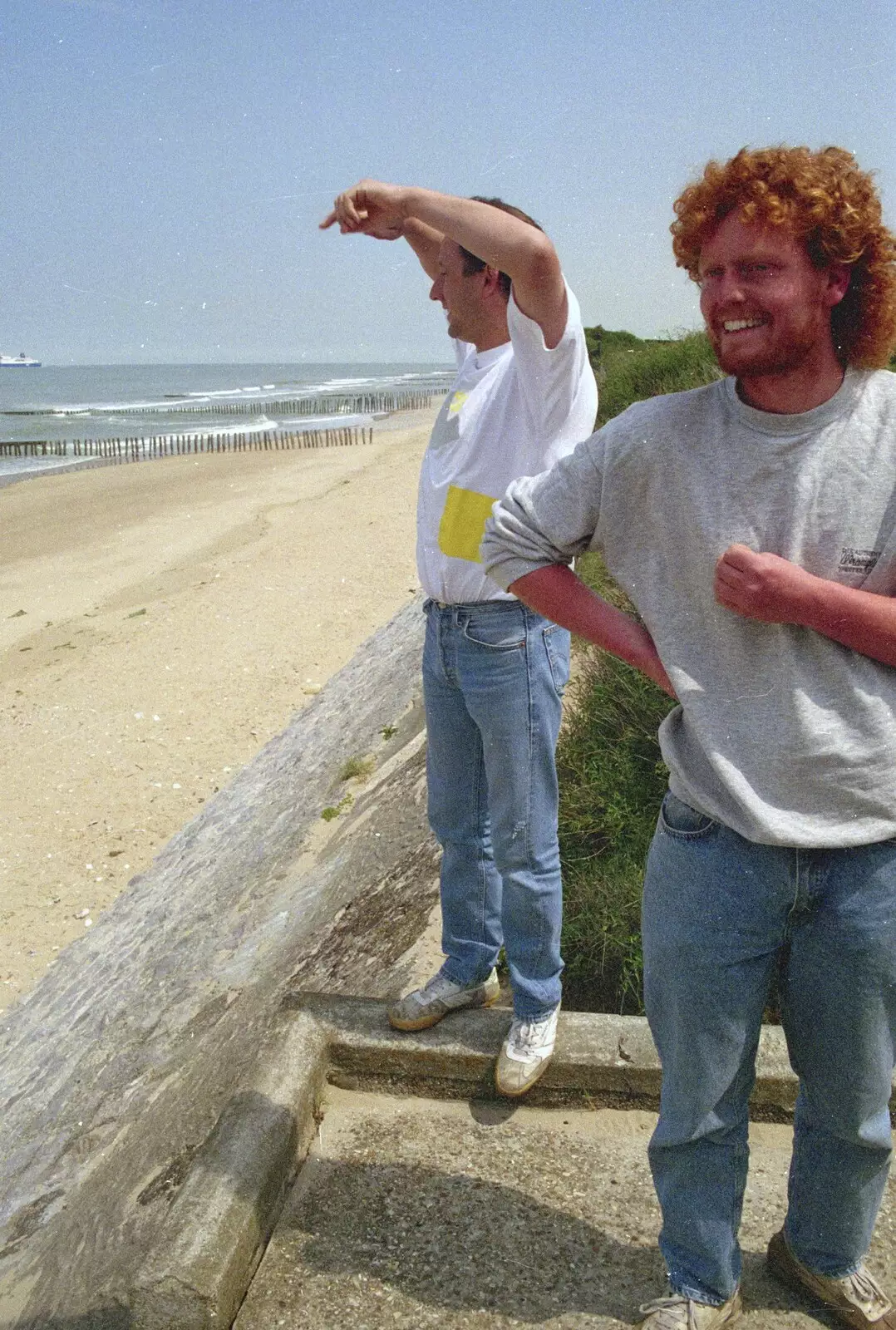 DH points at the sea, as Wavy laughs, from A Brome Swan Trip to Wimereux, France - 20th June 1996