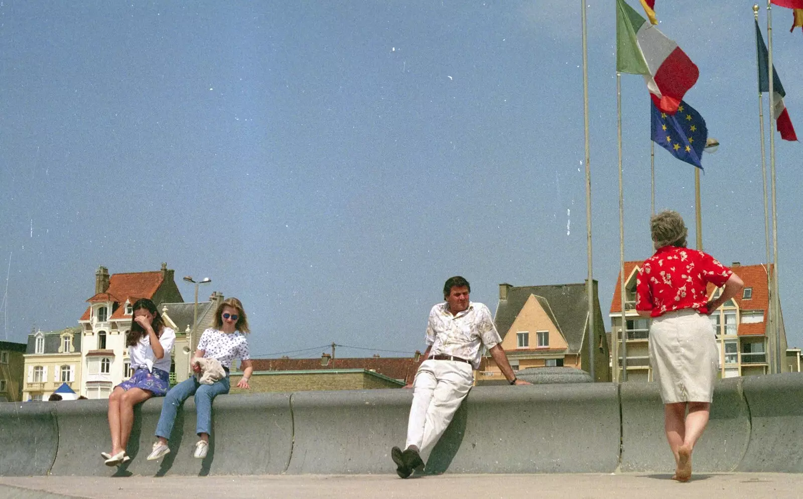 Alan's on the sea wall as Spammy roams around, from A Brome Swan Trip to Wimereux, France - 20th June 1996