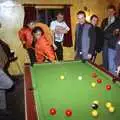 Natalie plays a shot, somewhat restricted by her massive orange Puffa jacket, A Conkers Night and CISU in the Eagle, Brome and Ipswich, Suffolk - 14th September 1996