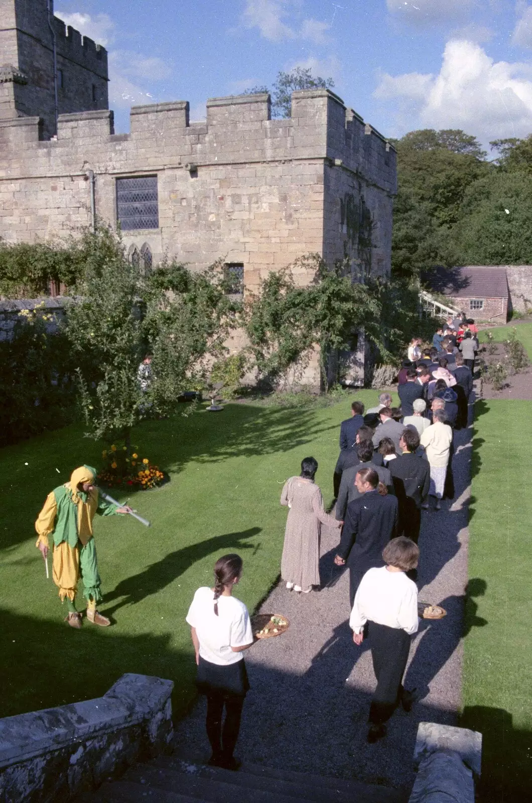 A jester does his thing in the gardens, from Stuart and Sarah's CISU Wedding, Naworth Castle, Brampton, Cumbria - 21st September 1996