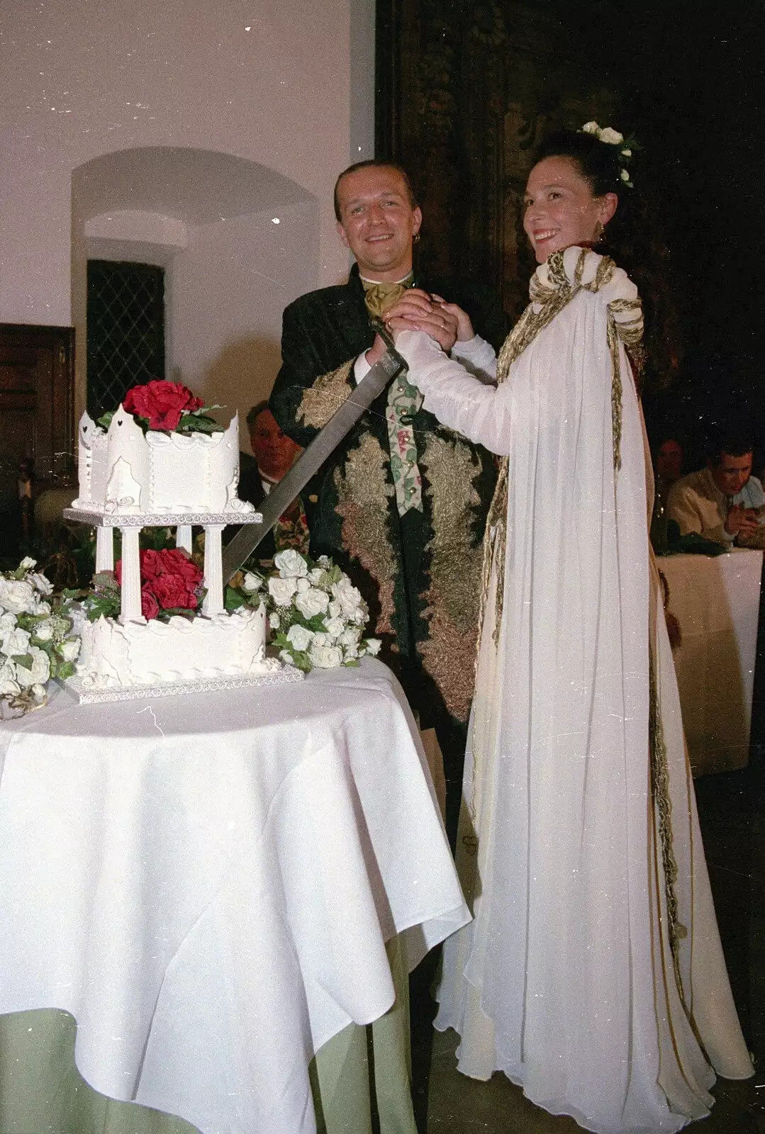 Slicing into cake with a massive sword, from Stuart and Sarah's CISU Wedding, Naworth Castle, Brampton, Cumbria - 21st September 1996