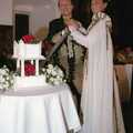 Slicing into cake with a massive sword, Stuart and Sarah's CISU Wedding, Naworth Castle, Brampton, Cumbria - 21st September 1996