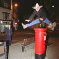 Orhan leaps over a pillar box, A CISU Night at Los Mexicanos Restaurant, Ipswich - 15th December 1996