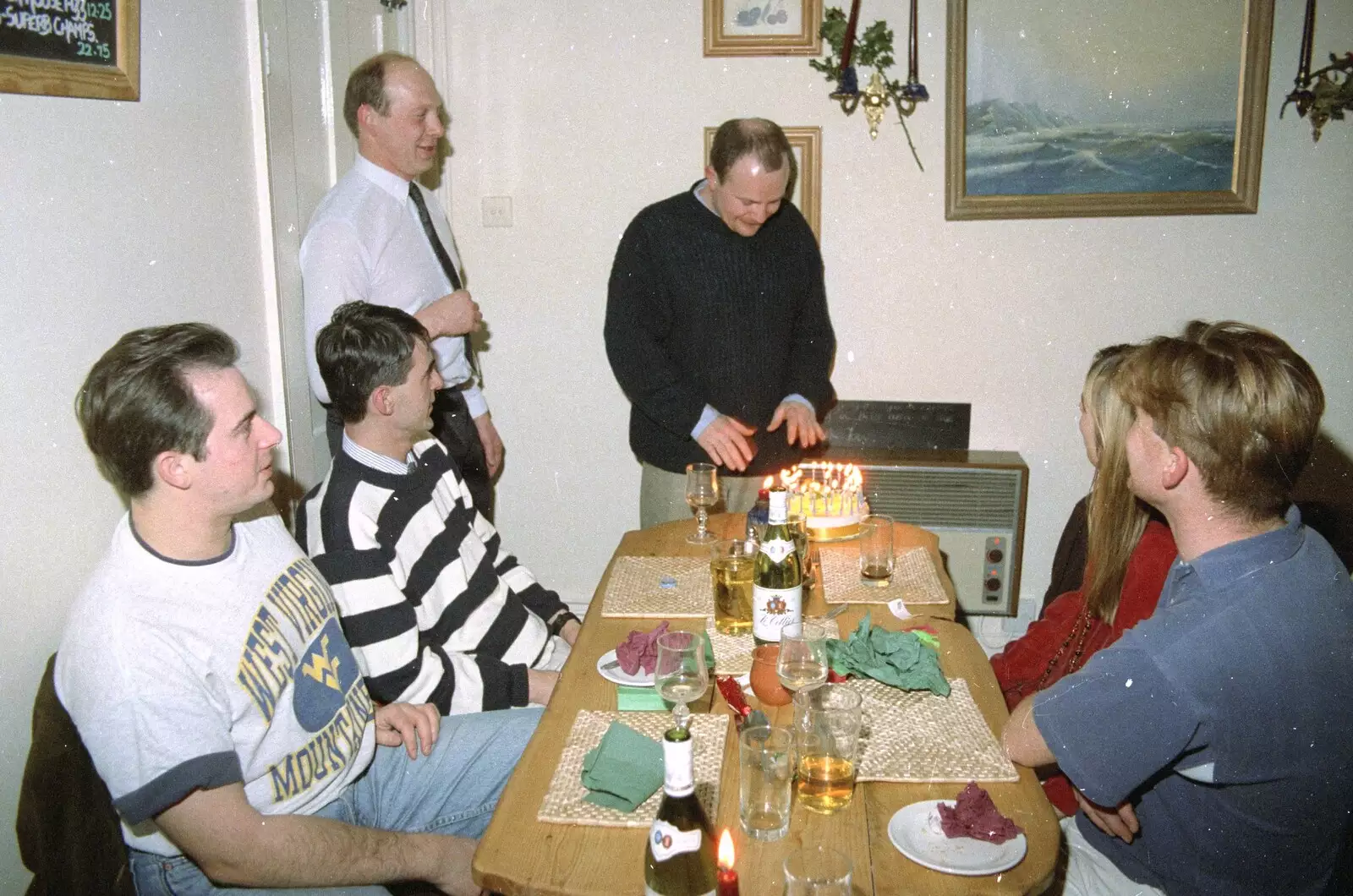 Hamish warms his hands on candles, from Hamish's Thirtieth Birthday, Hare and Hounds, Sway, Hampshire - 19th December 1996