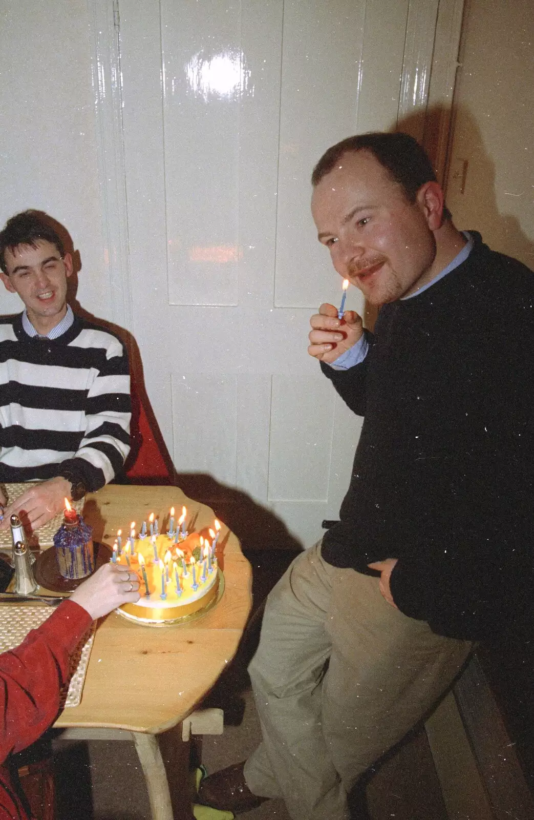 Hamish tries to set fire to his ear hair, from Hamish's Thirtieth Birthday, Hare and Hounds, Sway, Hampshire - 19th December 1996