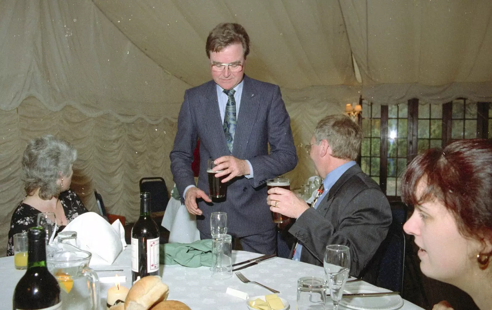 Peter Allen sits down after a trip to the bar, from The Brome Swan at Graham and Pauline's Wedding, Gissing Hall, Norfolk - 28th April 1997