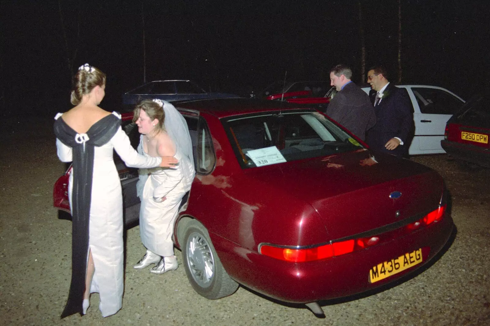 Pauline gets in to a Scorpio - the most hideous car ever built, from The Brome Swan at Graham and Pauline's Wedding, Gissing Hall, Norfolk - 28th April 1997