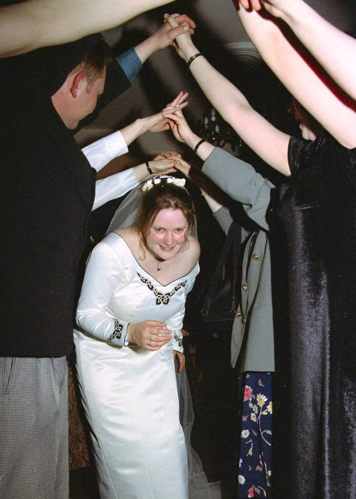 Pauline goes through the wedding tunnel thing, from The Brome Swan at Graham and Pauline's Wedding, Gissing Hall, Norfolk - 28th April 1997