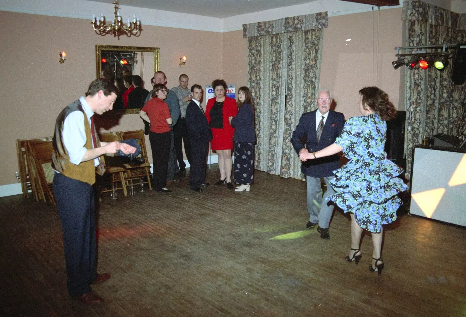 A group eyes the dancers with suspicion, from The Brome Swan at Graham and Pauline's Wedding, Gissing Hall, Norfolk - 28th April 1997