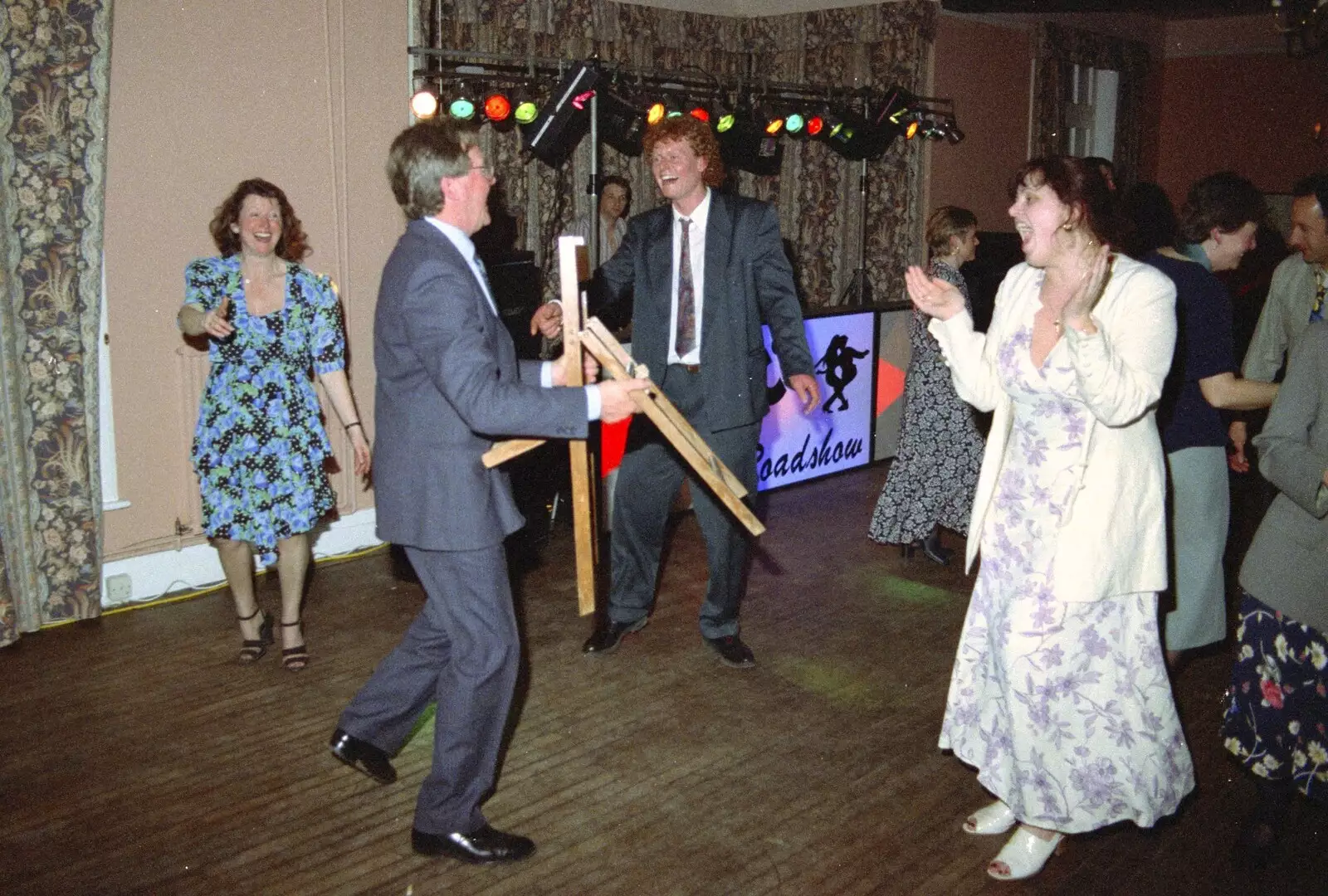 Peter Allen dances with a chair, from The Brome Swan at Graham and Pauline's Wedding, Gissing Hall, Norfolk - 28th April 1997