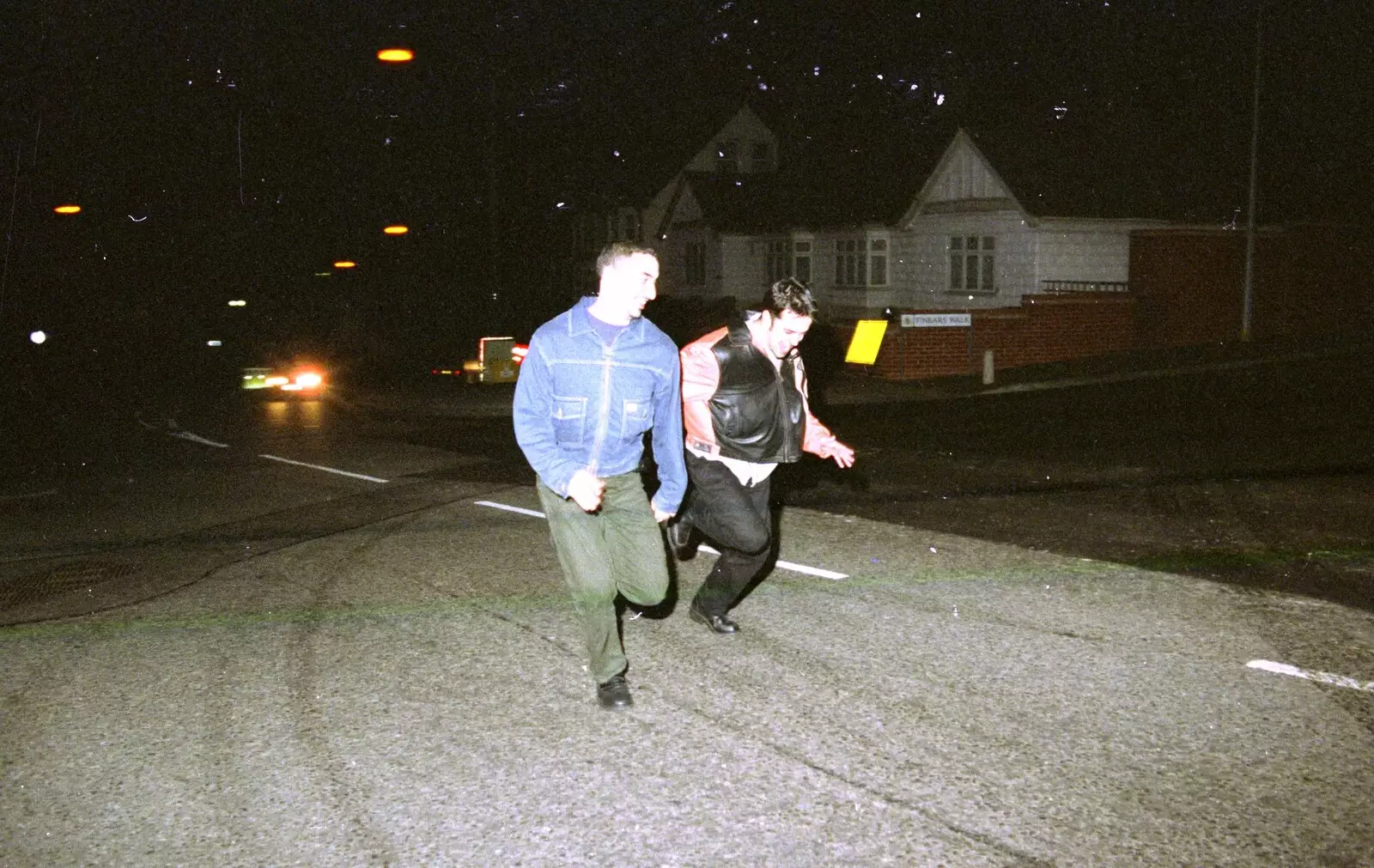 Orhan and Trevor run up the middle of Grove Lane, from CISU: A Chinese Restaurant and SCC Sports Day, Ipswich and Norwich - 1st May 1997