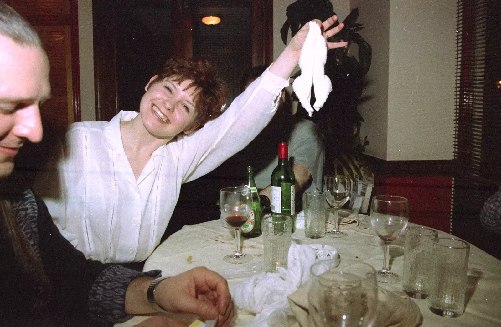 Lisa holds up the towel chicken, from CISU: A Chinese Restaurant and SCC Sports Day, Ipswich and Norwich - 1st May 1997