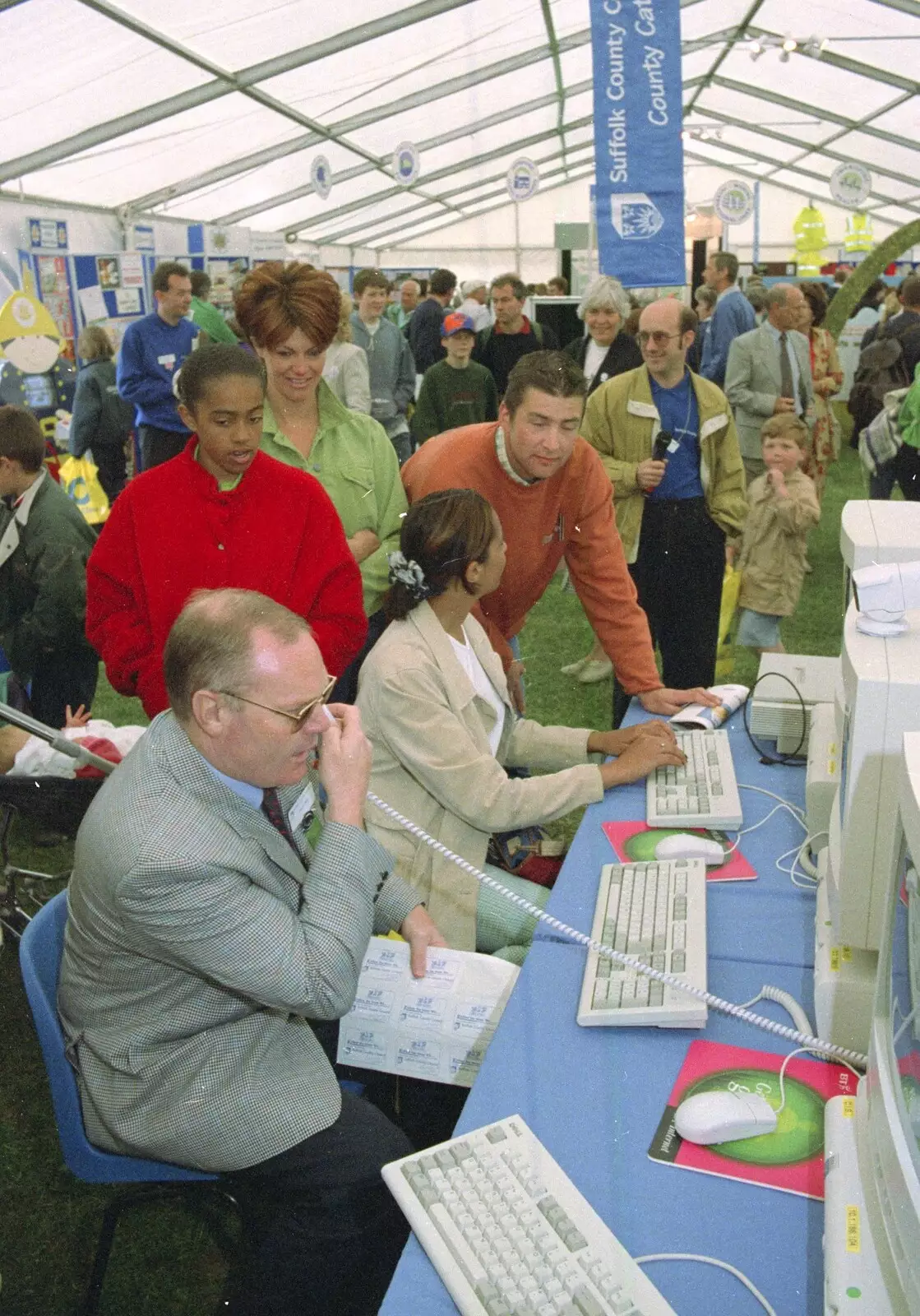 Peter Bye, SCC Chief Executive, takes a call, from CISU do 'Internet-in-a-field', Suffolk Show, Ipswich - May 21st 1997