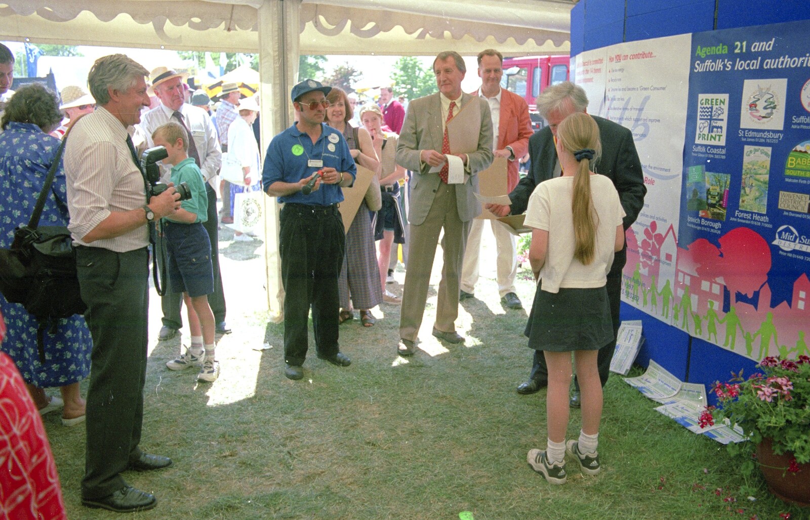 A schoolgirl is presented with something from CISU do 'Internet-in-a-field', Suffolk Show, Ipswich - May 21st 1997