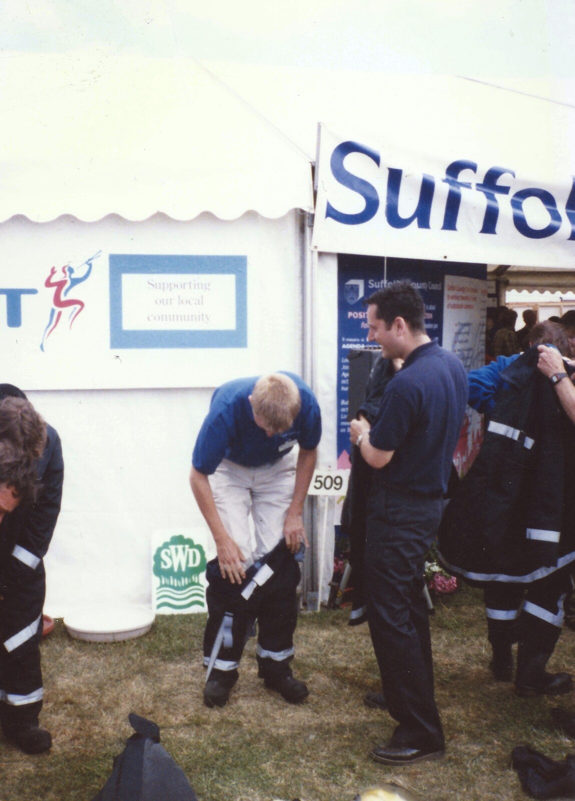 Nosher tries on a fireman's uniform from CISU do 'Internet-in-a-field', Suffolk Show, Ipswich - May 21st 1997