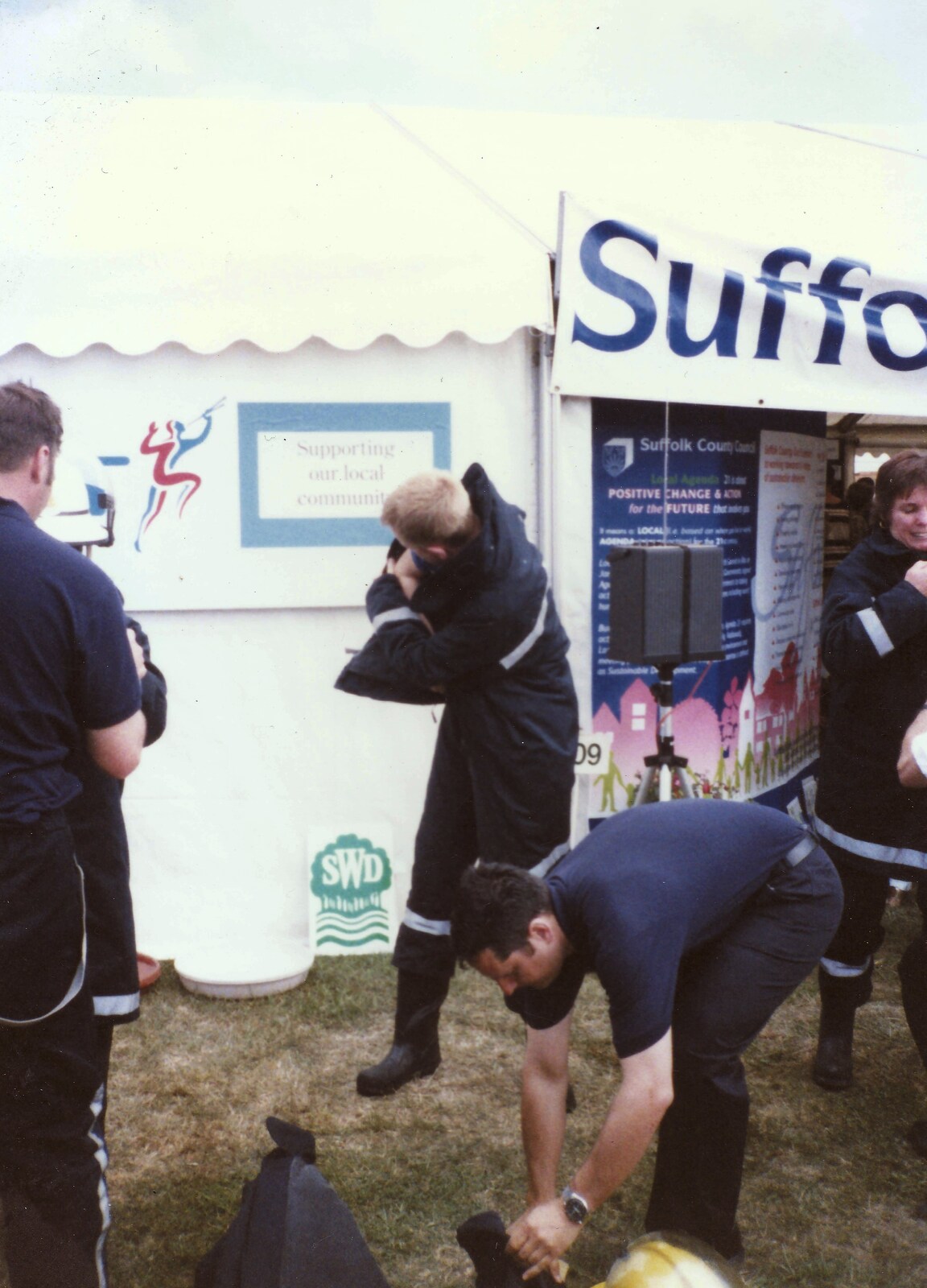 Nosher gets a fireman's jacket on - it's heavy work from CISU do 'Internet-in-a-field', Suffolk Show, Ipswich - May 21st 1997