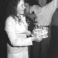 1997 Helen Morton presents a cake to Shane