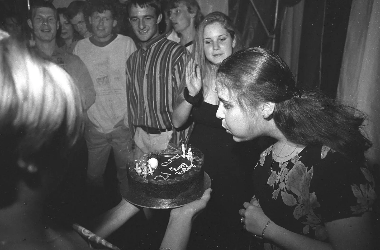 Claire blows out her candles, from Lorraine's 18th and Claire's 21st, The Swan Inn, Brome, Suffolk - 11th June 1997