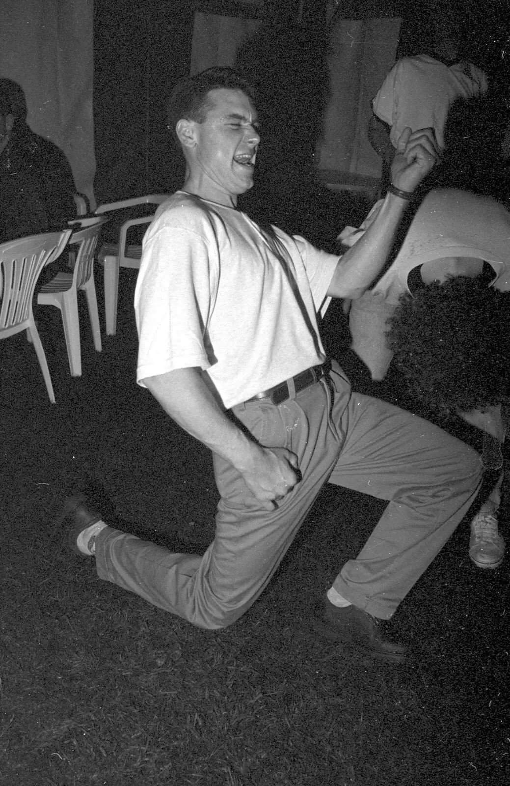 Ricey gets down for some air guitar, from Lorraine's 18th and Claire's 21st, The Swan Inn, Brome, Suffolk - 11th June 1997