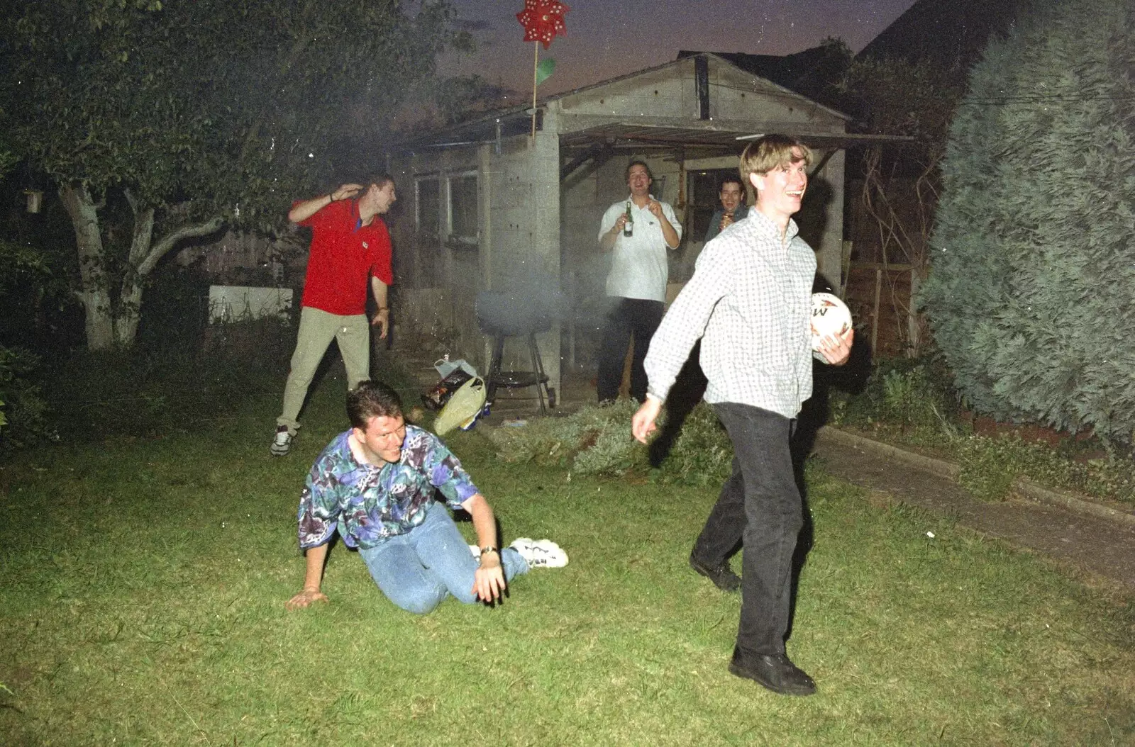 Paul runs off with the football, from Andrew's CISU Party and the Radio One Roadshow, Ipswich, Suffolk - 18th June 1997