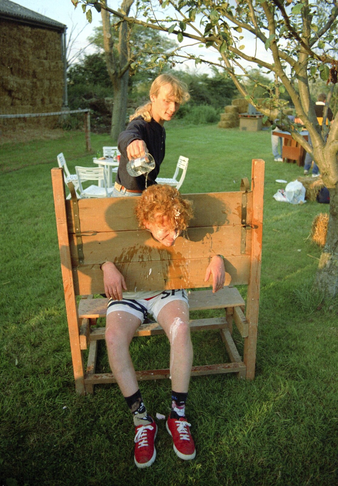 Jimmy pours water on Wavy's head from Bromestock 1 and a Mortlock Barbeque, Brome and Thrandeston, Suffolk - 24th June 1997
