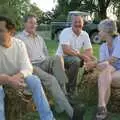 DH, Peter Allen, Ian and Spammy sit on bales, Bromestock 1 and a Mortlock Barbeque, Brome and Thrandeston, Suffolk - 24th June 1997