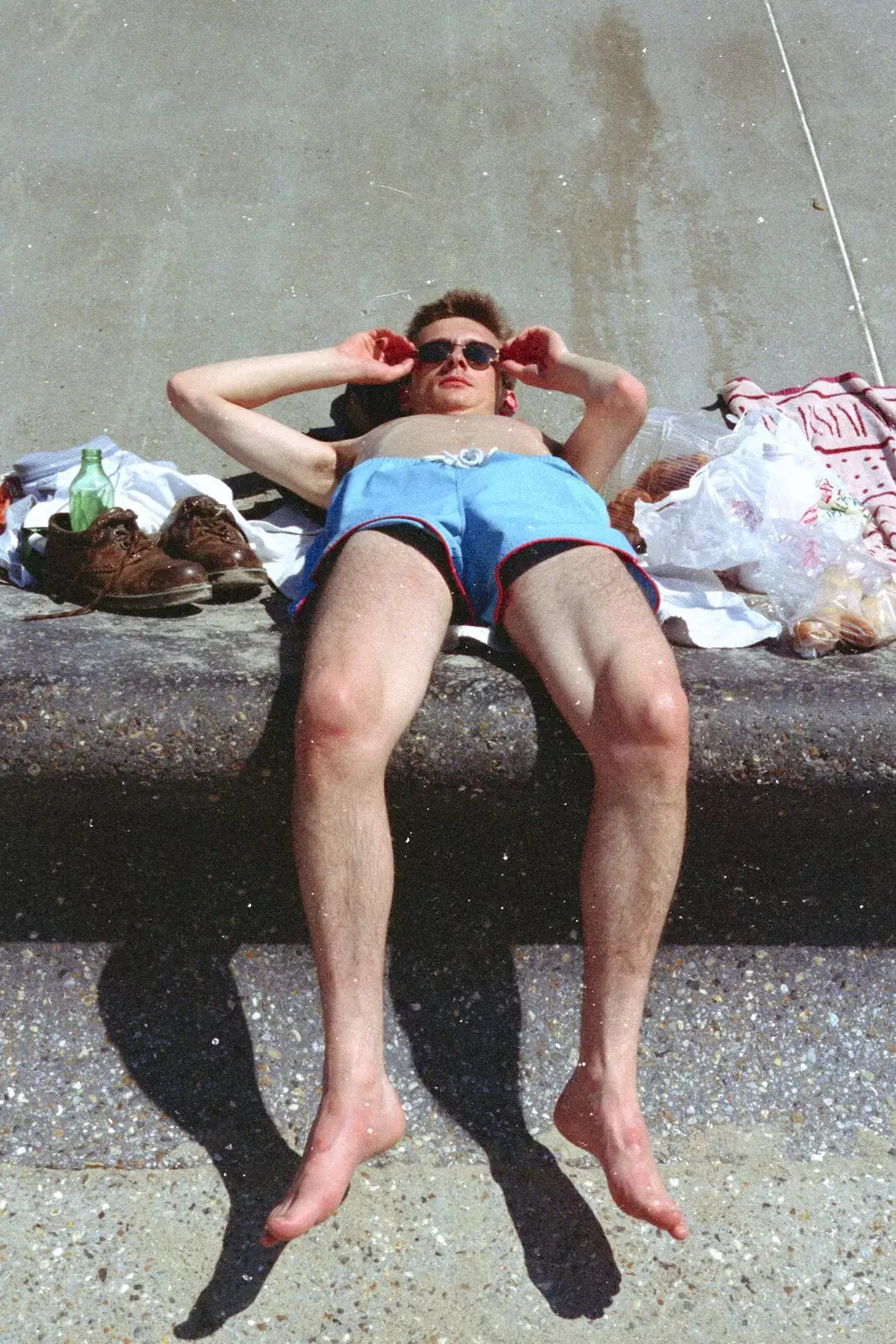 Andrew, flaked out on the wall, from A CISU Trip to Wimereux and the Swiss Rellies, France and Dorset - 6th July 1997