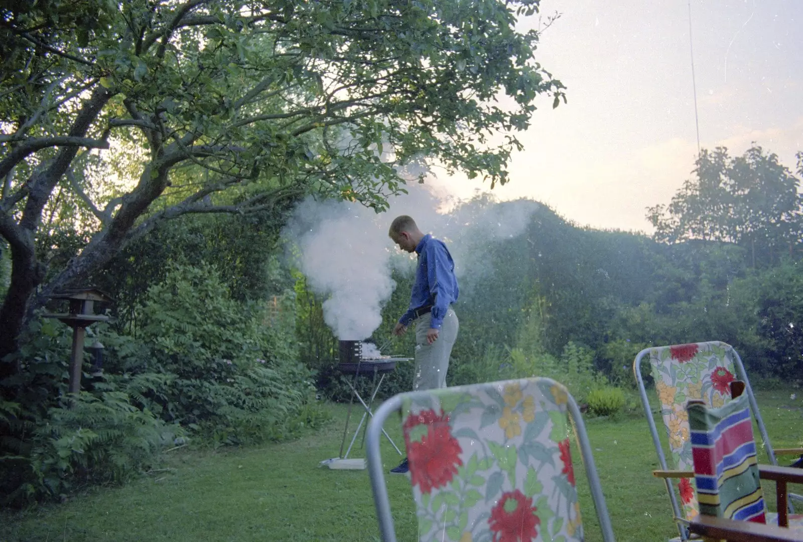 Nosher pokes the smoking barbeque, from A CISU Trip to Wimereux and the Swiss Rellies, France and Dorset - 6th July 1997