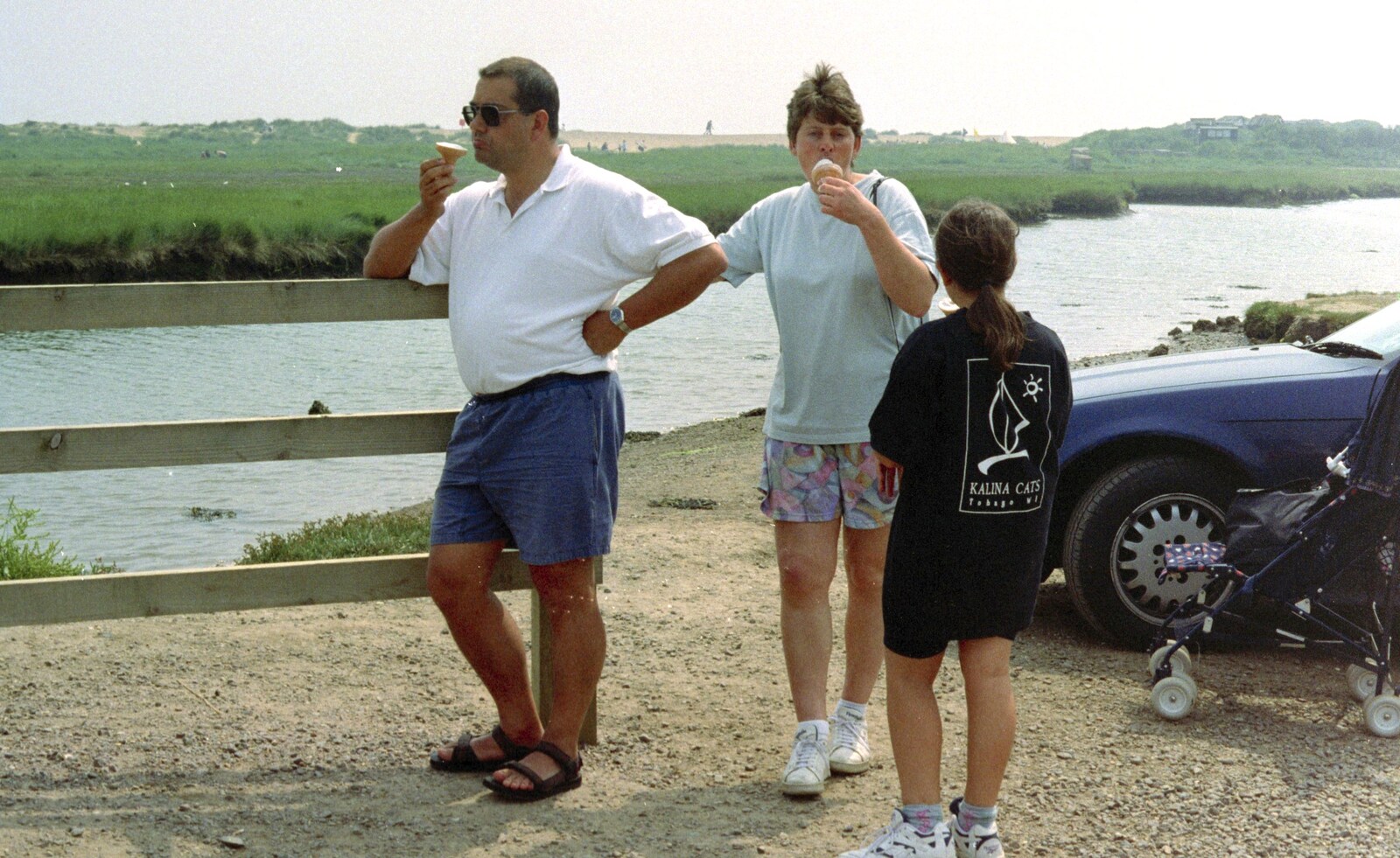 Roger, Pippa and Hannah eat ice cream from BSCC at the Beach, Walberswick, Suffolk - 15th July 1997