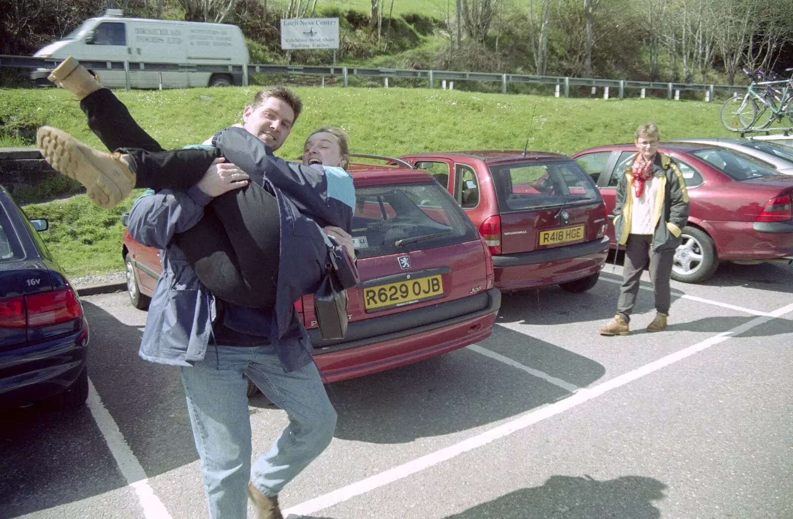 Sean flings Carole around in the car park, from A Trip to Pitlochry, Scotland - 24th March 1998