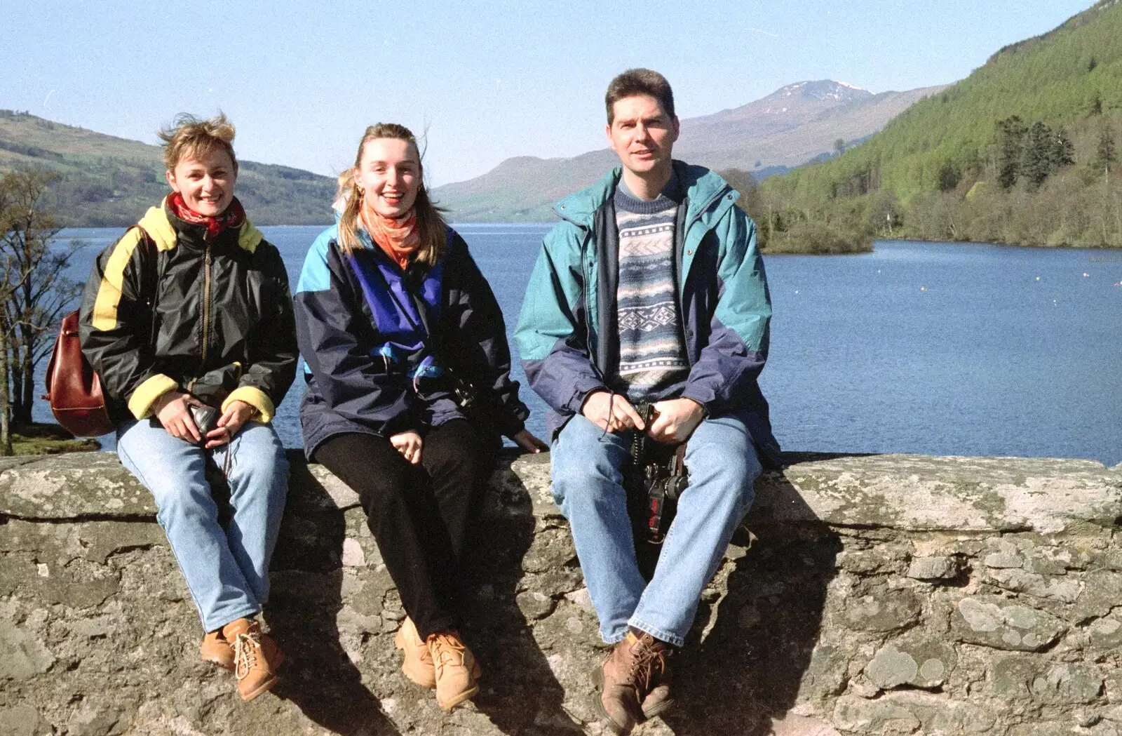 Isabelle, Carole and Sean on a wall, from A Trip to Pitlochry, Scotland - 24th March 1998