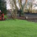 Danny trundles around rotovating the old lawn, Garden Rotovator Action, Brome, Suffolk - 28th March 1998