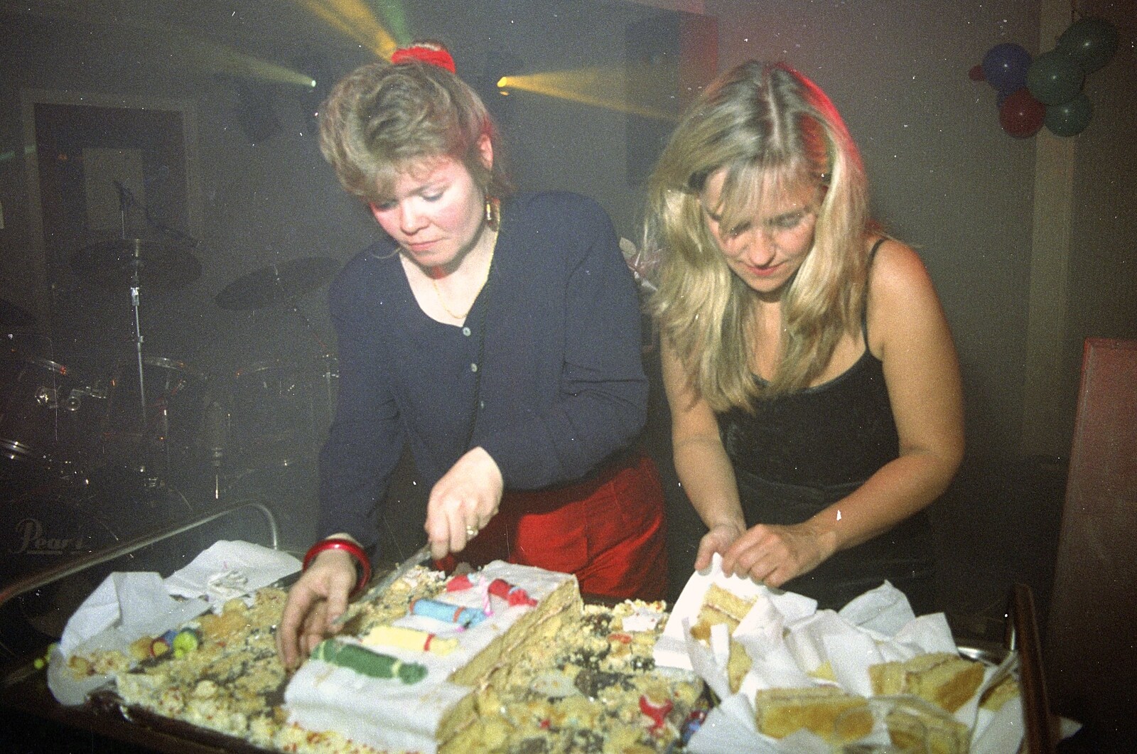 Sheila and Trudy cut the cake from A CISU Thrash in the SCC Social Club, Rope Walk, Ipswich - 4th April 1998
