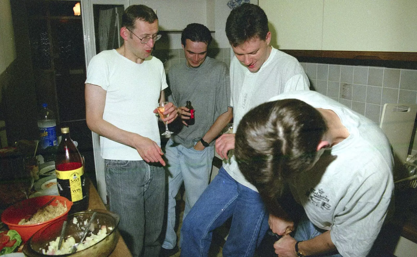 Dougie points at stuff, from Andrew's CISU Party, and Nosher's Garden Barbeque, Ipswich and Brome, Suffolk - June 10th 1998