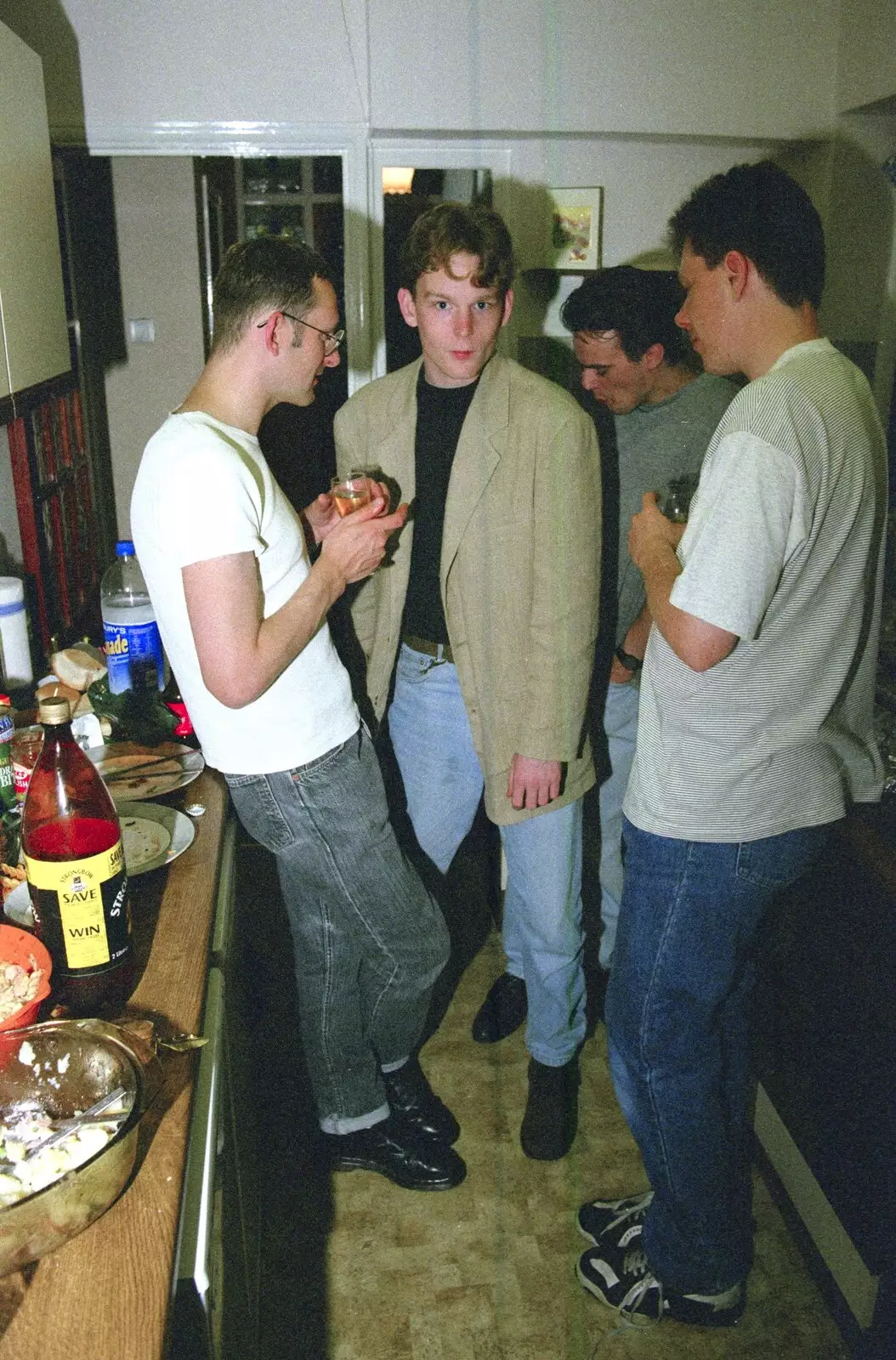 Joe steams through the kitchen on a mission, from Andrew's CISU Party, and Nosher's Garden Barbeque, Ipswich and Brome, Suffolk - June 10th 1998