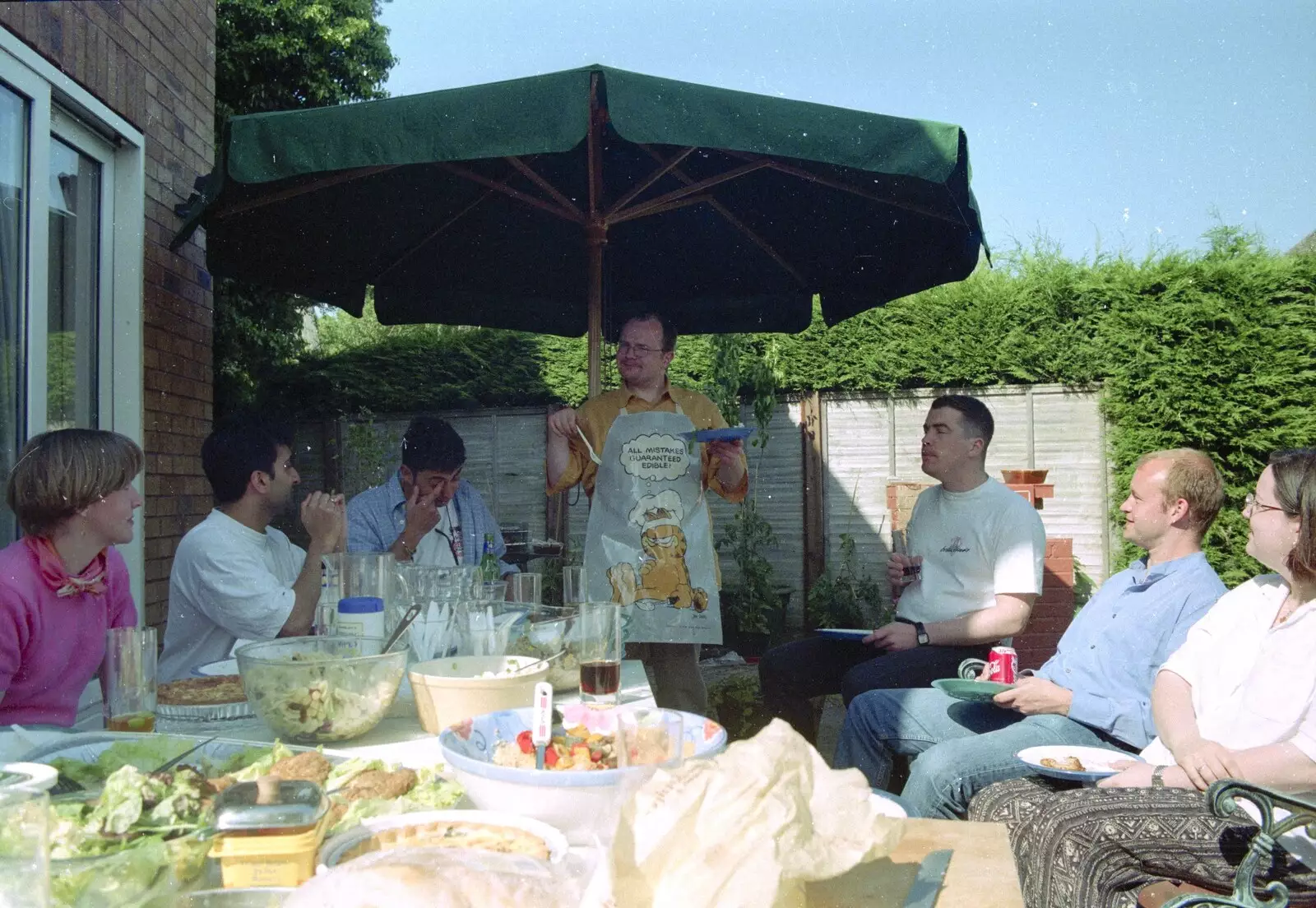 Hamish dishes some barbeque food out, from Hamish's Wine and CISU Go-Karting, Caxton, Cambridge - 23rd June 1998