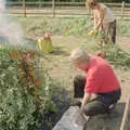 Tony adds more newspaper to the bonfire, Tony and Janet's Building Plot, and the Red Arrows, Eye, Suffolk - 22nd July 1998