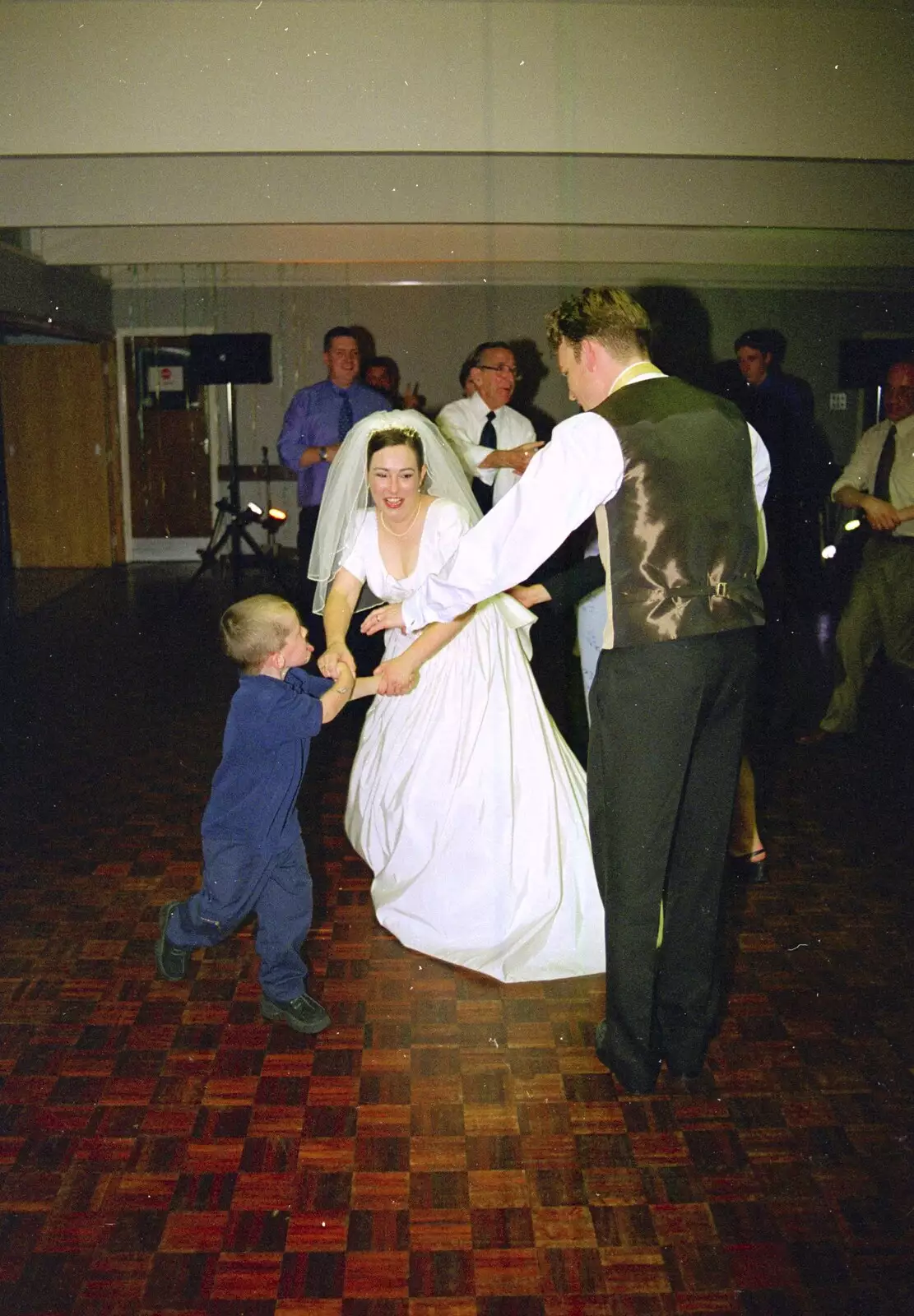 Lesley dances with a small child, from Joe and Lesley's CISU Wedding, Ipswich, Suffolk - 30th July 1998