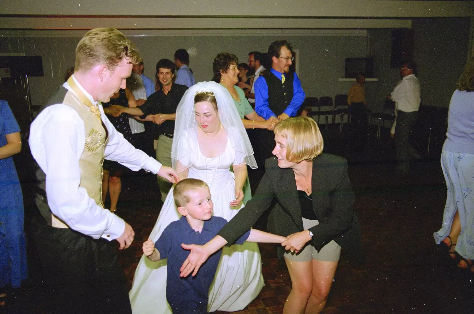 Joe, Lesley and a small dancing guest, from Joe and Lesley's CISU Wedding, Ipswich, Suffolk - 30th July 1998