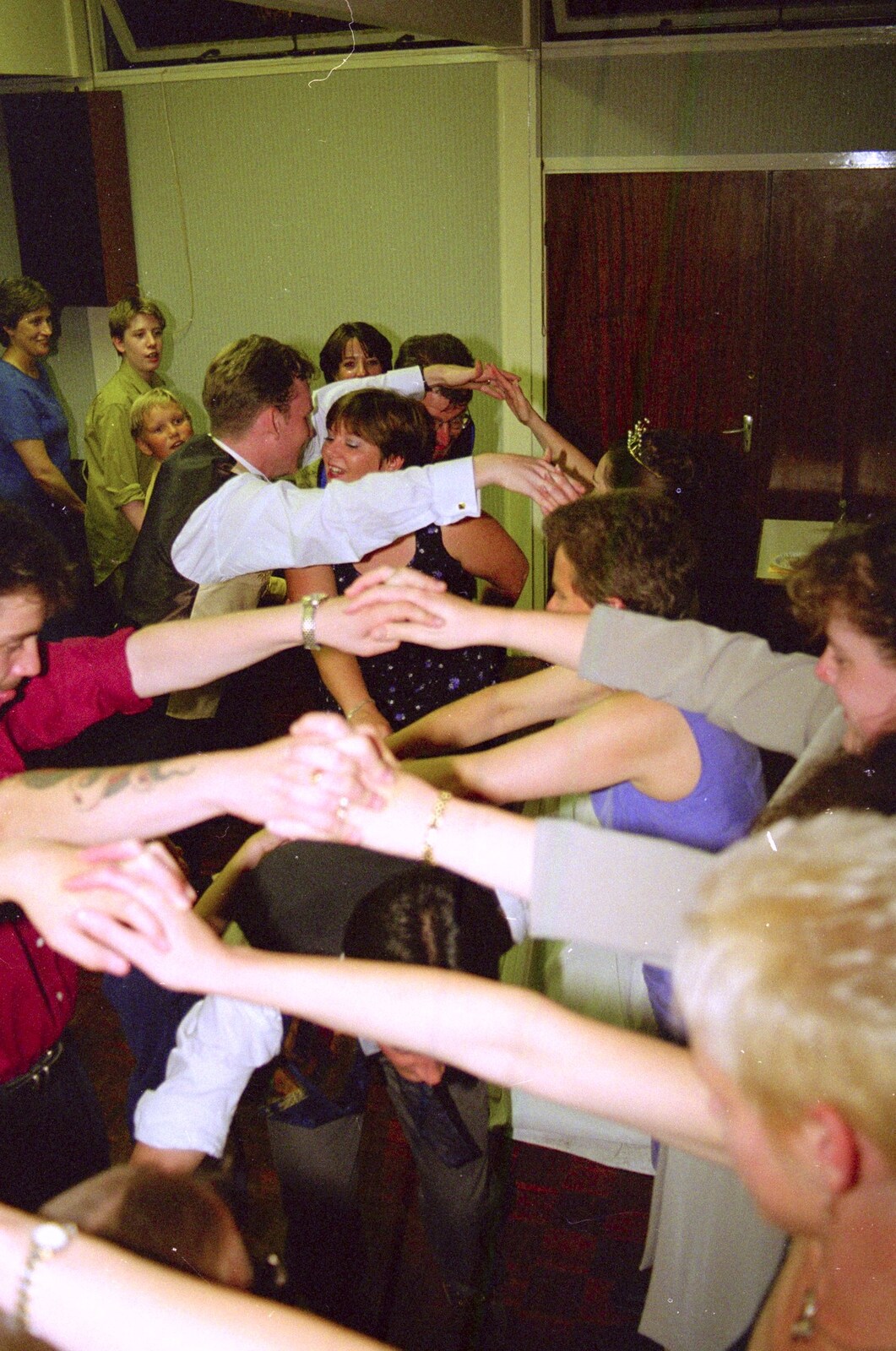 Linked hands form a guard of honour from Joe and Lesley's CISU Wedding, Ipswich, Suffolk - 30th July 1998