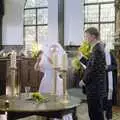 Lesley and Joe light candles, Joe and Lesley's CISU Wedding, Ipswich, Suffolk - 30th July 1998