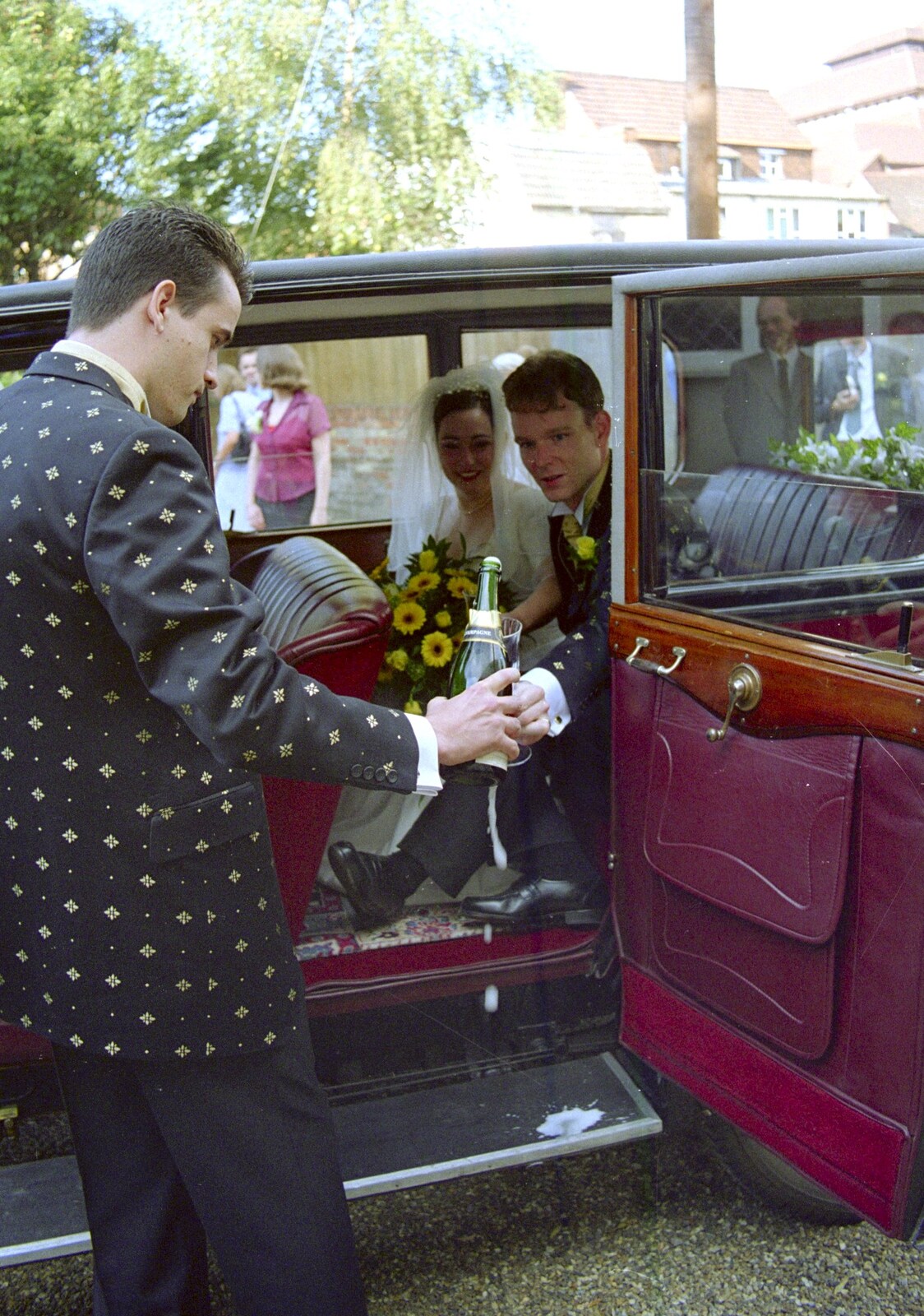 Some champagne is popped from Joe and Lesley's CISU Wedding, Ipswich, Suffolk - 30th July 1998