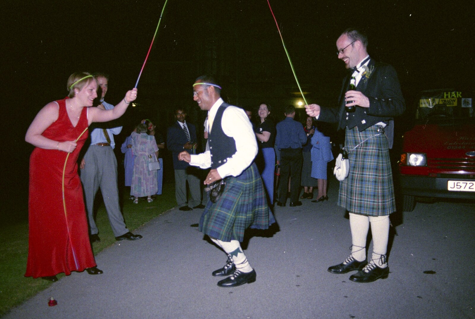 Hamish and Jane's Wedding, Canford School, Wimborne, Dorset - 5th August 1998: Skipping over a light-rope in the car park